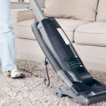 vacuuming with upright vacuum